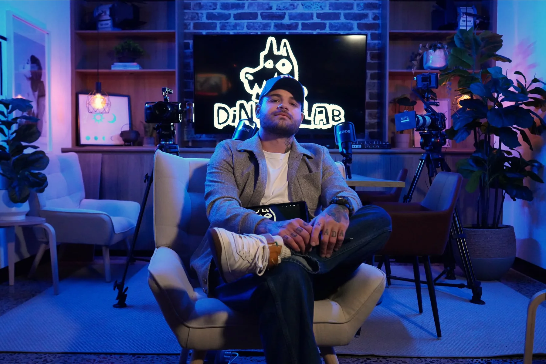 Gee seated in the Dingo Lab studio